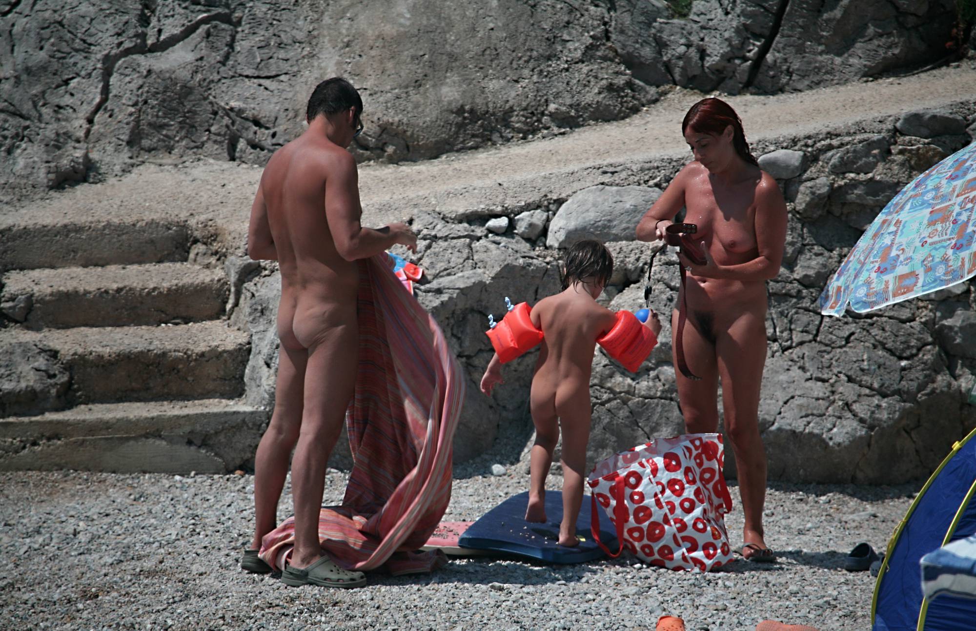 Naturist Family Packing Up - 2