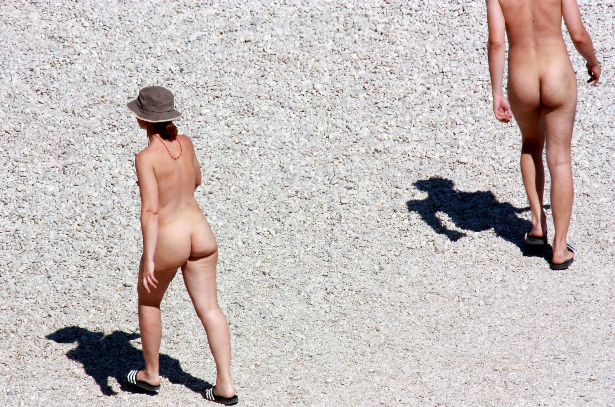 Nude and Topless Trio Walk - 1